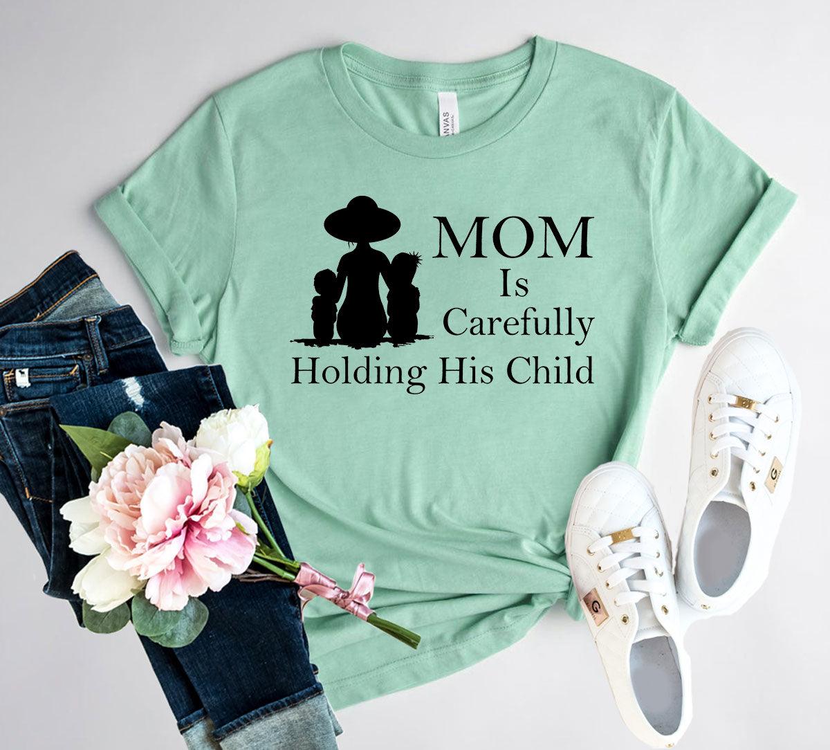 Mom Is Carefully Holding His Child Shirt - VirtuousWares:Global